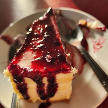 Juliano's Italian Restaurant - New York Cheesecake with homemade berry sauce - Italian Near Me - Hesperia, California Juliano's Italian Restaurant - New York Cheesecake with homemade berry sauce - Italian Near Me - Hesperia, California