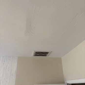 Handyman Kai - drywall with painters tape and cracks visible - Handyman Near Me