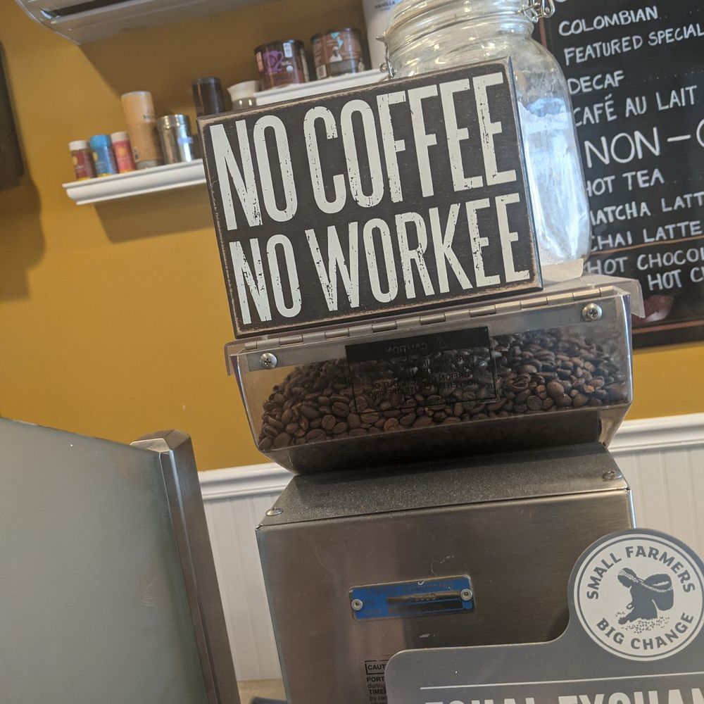 Signage win. Very extensive menu with reasonable prices for a cute coffee shop like this! Fresh coffee, free wi-fi, and kind service! Signage win. Very extensive menu with reasonable prices for a cute coffee shop like this! Fresh coffee, free wi-fi, and kind service!