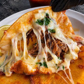 Fuego Cravings - Cheesy, crispy quesabirrias loaded with tender, birria and melted cheese, served with an extra side of rich, flavorful consommé for dipping. - Mexican Near Me - Upland, California Fuego Cravings - Cheesy, crispy quesabirrias loaded with tender, birria and melted cheese, served with an extra side of rich, flavorful consommé for dipping. - Mexican Near Me - Upland, California