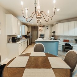 Kitchen remodel in Spring TX! Painted cabinets, quartz countertops, and new lighting fixtures!