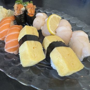 Yoshi Japanese Restaurant - Scallop (top right), salmon (left), tamago (bottom), monk fish liver (top left) - Japanese Near Me - Elk Grove, California Yoshi Japanese Restaurant - Scallop (top right), salmon (left), tamago (bottom), monk fish liver (top left) - Japanese Near Me - Elk Grove, California