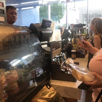 Morsel's - a man and a woman in a store - Cafes Near Me - Dallas, Texas