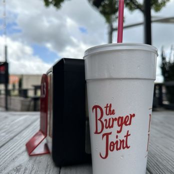 The Burger Joint - Montrose - Nice table outside, comfortable breeze - Burgers Near Me - Houston, Texas The Burger Joint - Montrose - Nice table outside, comfortable breeze - Burgers Near Me - Houston, Texas