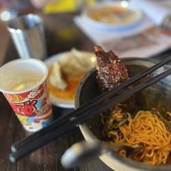 Oni - During my second visit I ordered appetizers, cold sake and the ribs with ramen noodle!  Oh my!