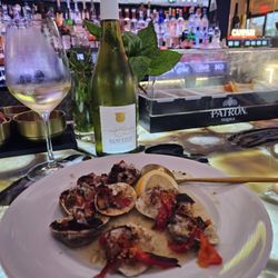 Mangia E Bevi - Clams Casino with a bottle of Sancerre