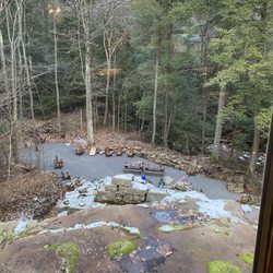 Cobblehaus Brewing Company - One of the fire pits by the falls
