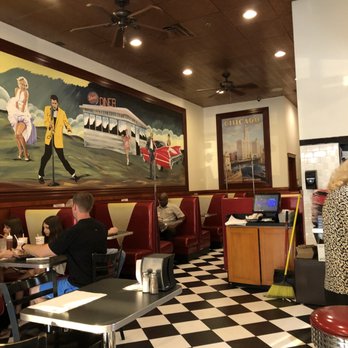 Schoops Hamburgers - The mural on the north wall is quite striking. - Burgers Near Me - Tinley Park, Illinois Schoops Hamburgers - The mural on the north wall is quite striking. - Burgers Near Me - Tinley Park, Illinois