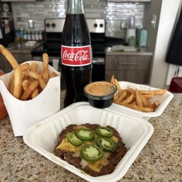 Spicy Jalapeo Double Cheeseburger , Fries, Mexican Coke, Side of Ghost Pepper Sauce Spicy Jalapeo Double Cheeseburger , Fries, Mexican Coke, Side of Ghost Pepper Sauce