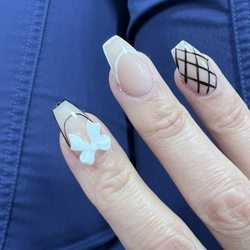 B&T Nails - I love the white bow with the hollow black French tip