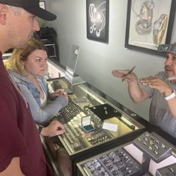 Quail Valley Jewelers - Jorge sharing his expertise with my son (the groom) and my daughter (helping him with the ring)