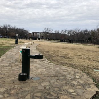 Northbark Dog Park - Small dog park has a couple of water fountains for people and dogs and several poop bag stands with trash cans. - Dog Parks Near Me - Dallas, Texas Northbark Dog Park - Small dog park has a couple of water fountains for people and dogs and several poop bag stands with trash cans. - Dog Parks Near Me - Dallas, Texas