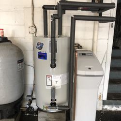 Lakeside Plumbing, Heating, and Cooling - Indirect hot water storage tank installed and wrapped with insulation so you don't lose heat off the copper pipes