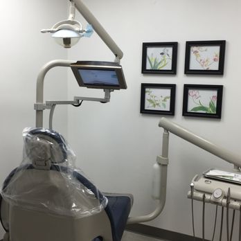 Ricardo Yap, DDS - treatment room with chair-mounted TV for customer to enjoy - General Dentistry Near Me - South San Francisco, California Ricardo Yap, DDS - treatment room with chair-mounted TV for customer to enjoy - General Dentistry Near Me - South San Francisco, California