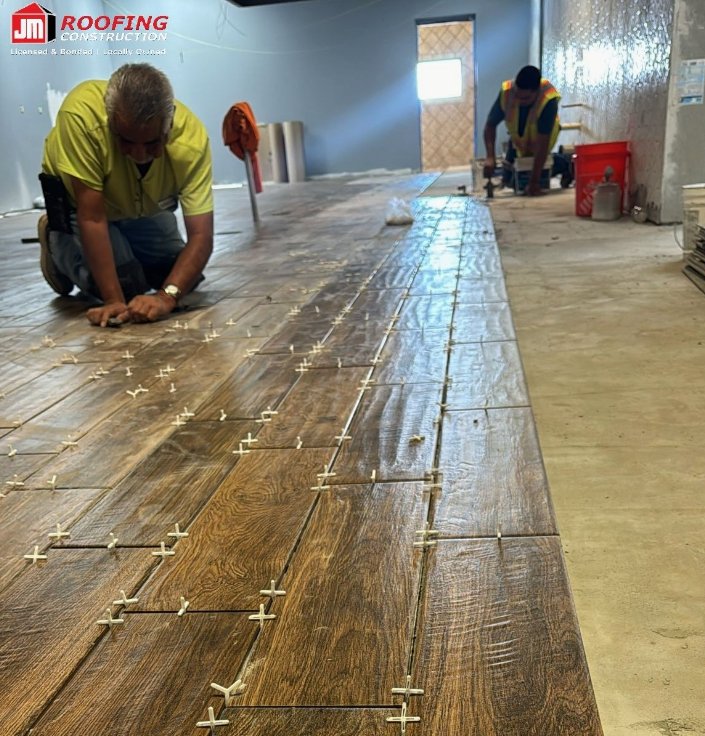 Slide of JM Roofing Construction