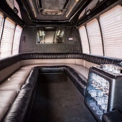 1st Class Transportation - 20 pax Luxury Limo Coach. Comes with iPod hookup to play your own music, fiber optic lighting, cooler, and a 42" TV.