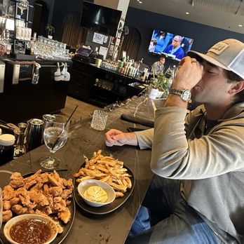 Dread River Distilling Company - crispy chicken and truffle fries. - Distilleries Near Me - Birmingham, Alabama