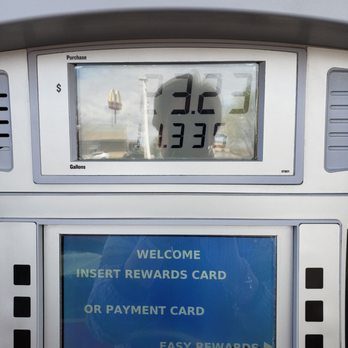 Circle K - a gas pump with a sign that reads welcome insert rewards card or payment card - Convenience Stores Near Me - Albuquerque, New Mexico