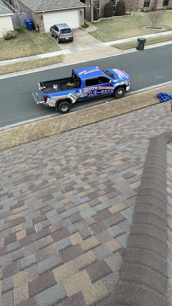 Slide of Chuy's Roofing