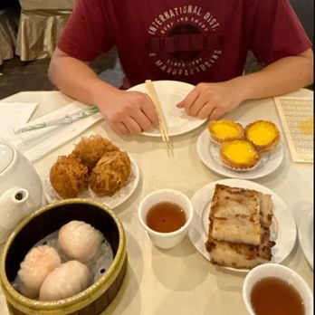 Legend Seafood Restaurant - Top to bottom, left to right.   Taro puff, egg tarts Shrimp dumpling, Pan-fried turnip cake - Dim Sum Near Me - Honolulu, Hawaii
