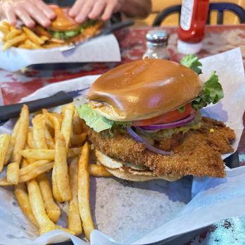 The Joint St. Pete - Breaded pork tenderloin sandwich, a Hoosier classic, right here in St Pete! - Sports Bars Near Me - Saint Petersburg, Florida