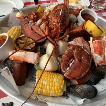 Queensyard - The Queens Seafood Boil for 2: Lobster, King Crab Legs, Shrimp, Mussels, Cockles, Sausage, Corn & Potatoes - Modern European Near Me - New York, New York Queensyard - The Queens Seafood Boil for 2: Lobster, King Crab Legs, Shrimp, Mussels, Cockles, Sausage, Corn & Potatoes - Modern European Near Me - New York, New York
