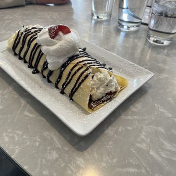 The Nucleus Cafe - Strawberry Nutella Crêpe with Whipped Cream - Breakfast & Brunch Near Me - Eau Claire, Wisconsin