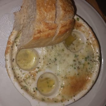 Seasons Restaurant - Escargot and sourdough bread dipped in garlic butter. - New American Near Me - Lone Pine, California Seasons Restaurant - Escargot and sourdough bread dipped in garlic butter. - New American Near Me - Lone Pine, California
