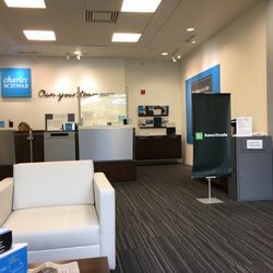 Charles Schwab - Schwab desk and deposit to the left.