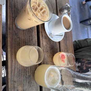 Sibling by Pushkin’s - Oat milk sugar latte , cup of coffee and grapefruit mimosa carafe - New American Near Me - Sacramento, California Sibling by Pushkin’s - Oat milk sugar latte , cup of coffee and grapefruit mimosa carafe - New American Near Me - Sacramento, California