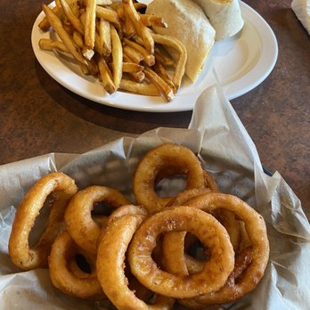 Archer's Tavern Kettering - Buffalo chicken wrap with onion rings and fries - Bars Near Me - Dayton, Ohio Archer's Tavern Kettering - Buffalo chicken wrap with onion rings and fries - Bars Near Me - Dayton, Ohio
