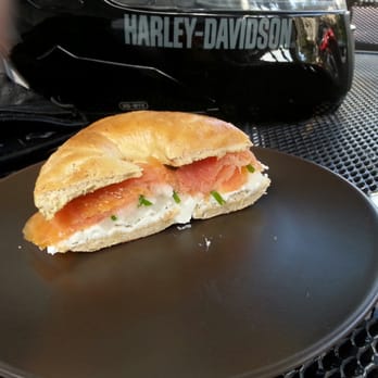Cafe 906 - Smoked salmon bagel with fresh chives and onions and a rich cream cheese.  Perfectly made and baked bagel. - Cafes Near Me - Orlando, Florida