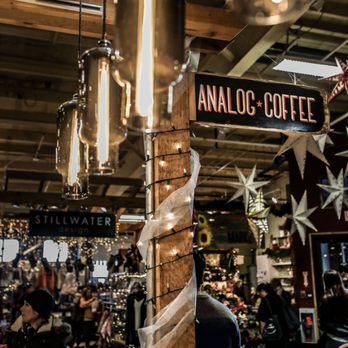 Analog Coffee - a man standing in a coffee shop - Coffee & Tea Near Me - Calgary, Alberta