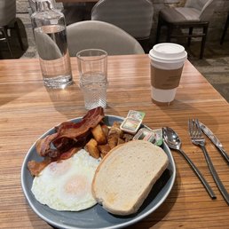 Eggs to order, sourdough toast, bacon and potatoes. Eggs to order, sourdough toast, bacon and potatoes.