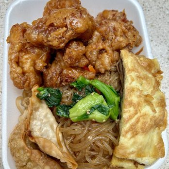 Aja Sushi & Bento - Honey fried chicken, potstickers, fried egg/meat, vegetables and chap chae. - Japanese Near Me - Honolulu, Hawaii