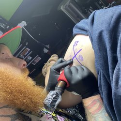 Savage Tattoo - Spencer working on my tattoo