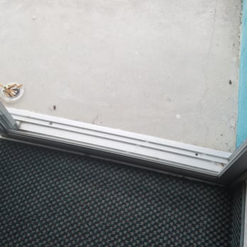 Howard Johnson by Wyndham Lexington - Ashtray with someone else's cigarettes.  Also, dead bugs....this is what our patio looked like when we arrived.  Gross and lazy. - Hotels Near Me - Lexington, Virginia