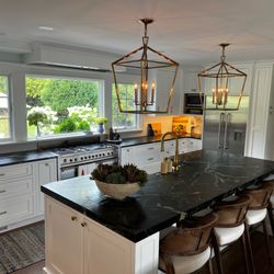 Love Creek Construction - Kitchen redesign with a soapstone countertop addition.