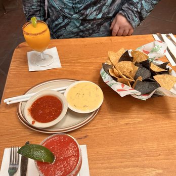 The Shed - Mango and blood orange margaritas and queso and Shed Salsa & Tortilla Chips - New Mexican Cuisine Near Me - Santa Fe, New Mexico The Shed - Mango and blood orange margaritas and queso and Shed Salsa & Tortilla Chips - New Mexican Cuisine Near Me - Santa Fe, New Mexico