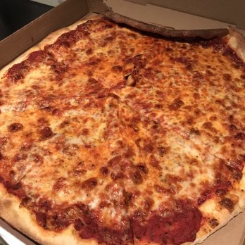 sLICe LIC - Super high quality (note the crammed in box appearance) pork pepperoni (a.k.a. plain cheese pizza). Oy! - Italian Near Me - Long Island City, New York