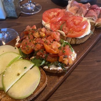 Postino Addison - Apple fig, BLT, Mozzarella & Tomato, prosciutto and fig - Wine Bars Near Me - Dallas, Texas Postino Addison - Apple fig, BLT, Mozzarella & Tomato, prosciutto and fig - Wine Bars Near Me - Dallas, Texas