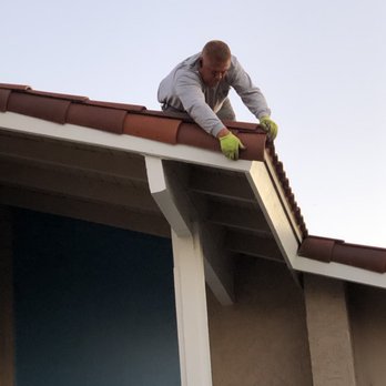 Parkside Roofing - Izzy repairing a loose tile - Roofing Near Me - Fullerton, California