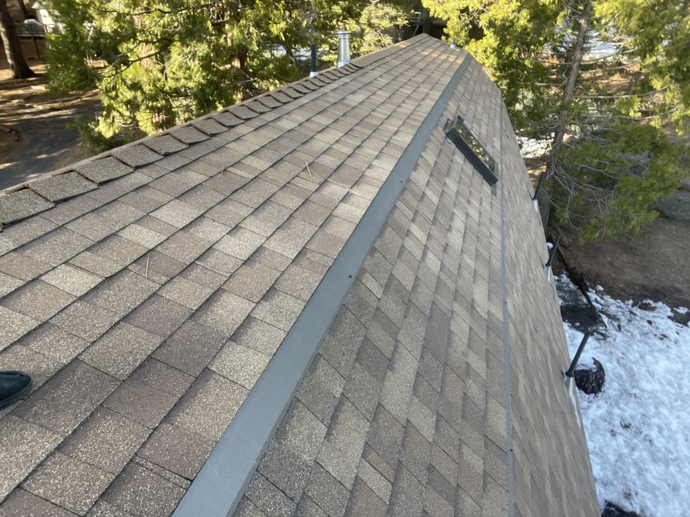 Slide of JMK Roofing