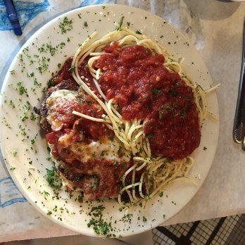 The Cherry Tomato - Chicken parmigiana with marinara sauce spaghetti - Italian Near Me - Denver, Colorado