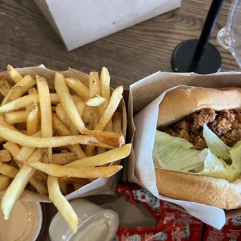 The Rex Burger & Lobster - Spicy Chicken Sandwich and fries - American Near Me - Mineola, New York The Rex Burger & Lobster - Spicy Chicken Sandwich and fries - American Near Me - Mineola, New York