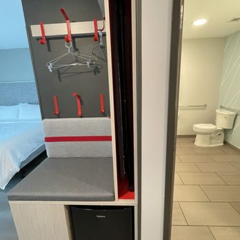 Avid Hotel - Red hooks and ironing board - Hotels Near Me - Sioux City, Iowa
