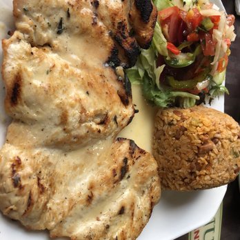 El Conuco Restaurante - Lemon grilled chicken with 2 sides - Dominican Near Me - Union City, New Jersey