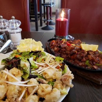 Larry's - Sizzling sisig and Calamares - Bars Near Me - Lübeck, SH