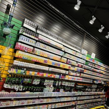 High Maintenance Smoke Shop - Juice wall - Tobacco Shops Near Me - Tempe, Arizona
