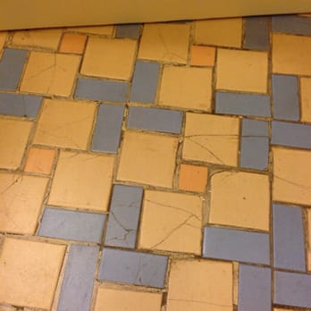 Hotel Mac Rae - cracked tile flooring throughout the entire bathroom - Hotels Near Me - Avalon, California Hotel Mac Rae - cracked tile flooring throughout the entire bathroom - Hotels Near Me - Avalon, California